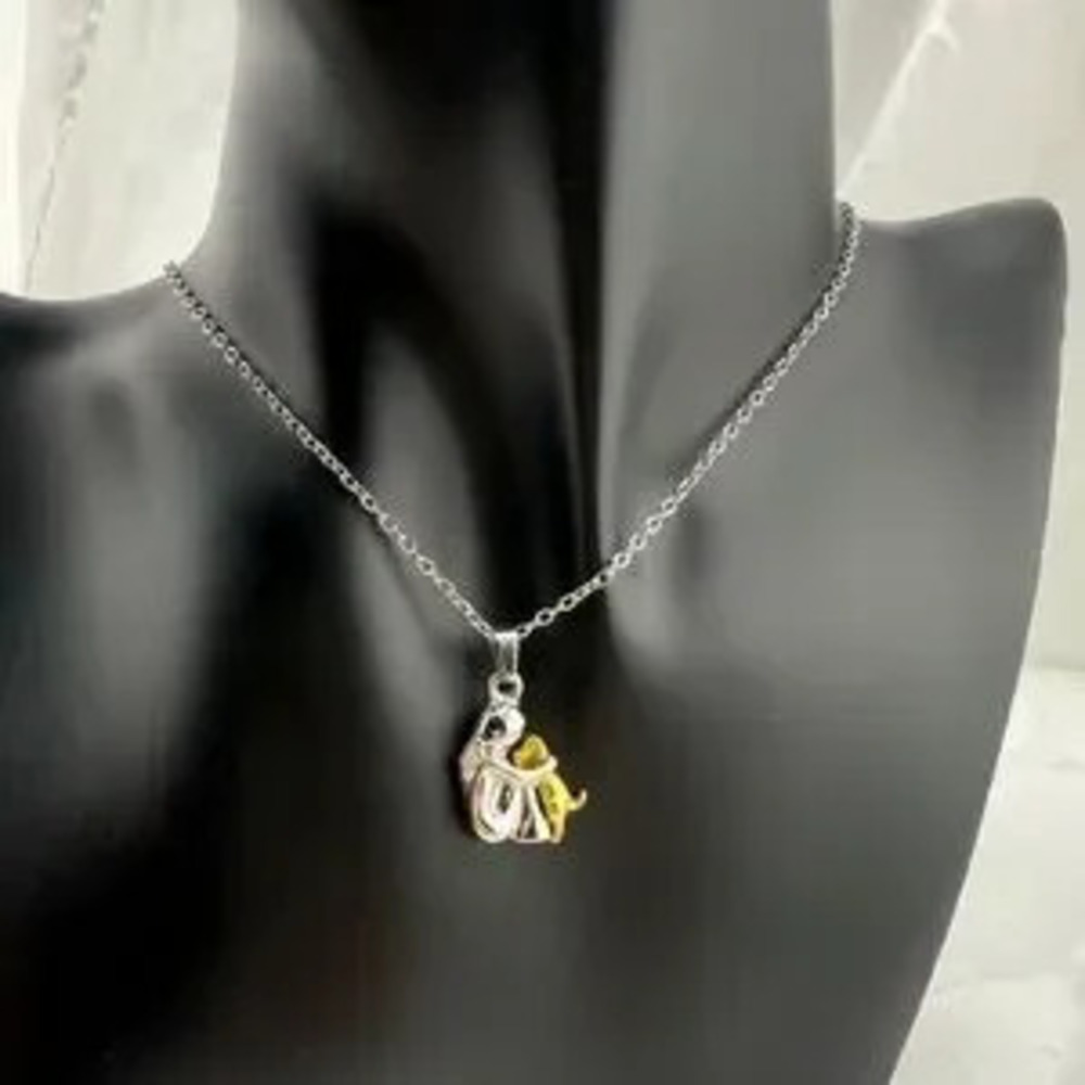 Anthropologie Pet Love Silver and Gold Abstract Pendant Necklace Adjustable